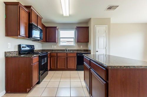 6958 Chessgate Falls Ln, Richmond TX  77469-1818 exterior