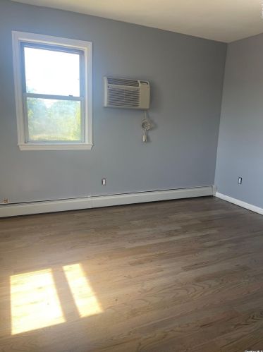 496 Catskill Ave, North Lindenhurst NY  11757-2744 exterior