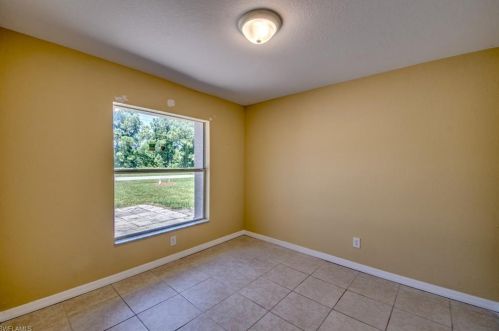 217 Ivan Ave, Lehigh Acres FL 33973-2011 exterior