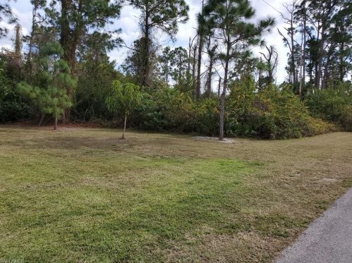 507 Aspen Ave, Lehigh Acres FL 33974-9613 exterior