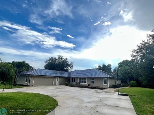 2551 Racquet Club Dr, Palm City FL  34990-2304 exterior