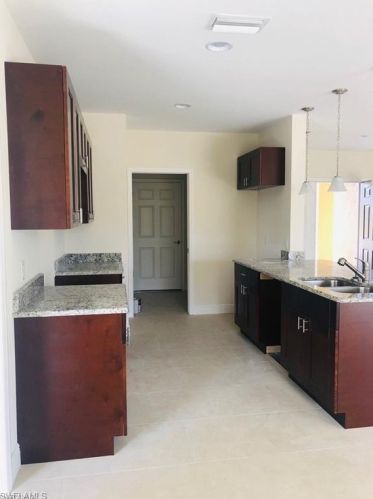 3112 18 St, Lehigh Acres FL 33971-5552 exterior