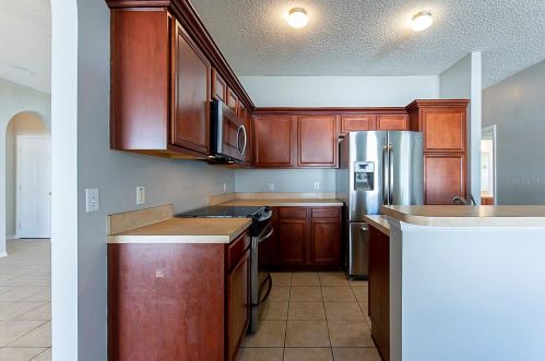 13 Inconnu Dr, Kissimmee FL  34759-4832 exterior