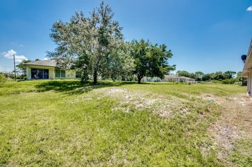 217 Ivan Ave, Lehigh Acres FL 33973-2011 exterior