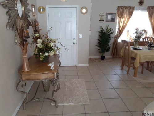 16 Burning Ember Ln, Palm Coast, FL 32137-8809