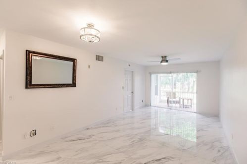 105 Wading Bird Cir, Naples, FL 34110-9201