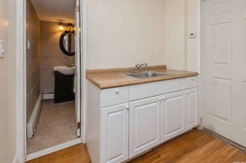 235 Farmers Ave, North Lindenhurst NY  11757-1815 exterior