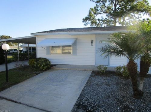 39 Dawn Flower Cir, Lehigh Acres, FL 33936-7358