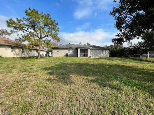 911 Anza Ave, Lehigh Acres, FL 33971-6525