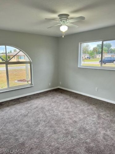 21 Lincoln Ave, Lehigh Acres FL 33936-1454 exterior