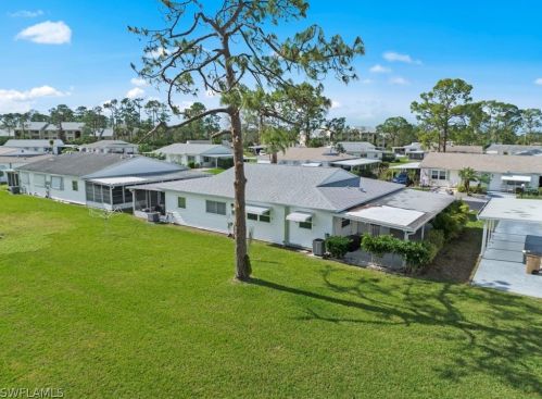 18 Dawn Flower Cir, Lehigh Acres FL 33936-7355 exterior