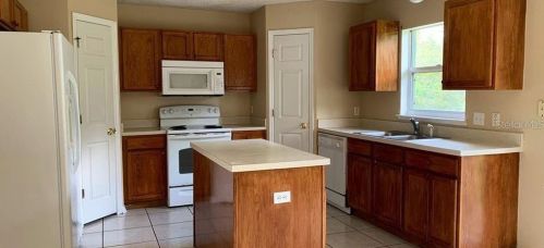 677 Milan Dr, Kissimmee FL  34758-4305 exterior