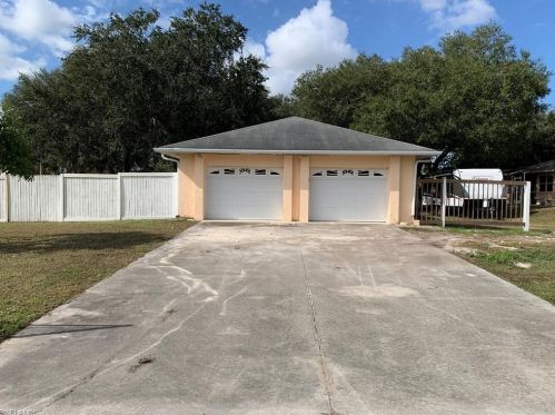 517 Hibiscus Ave, Lehigh Acres, FL 33972-7828