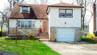 19 Margaret Dr, Roosevelt, NY 11575-1534