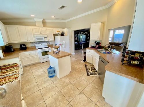 1101 Olive Ave, Lehigh Acres FL 33971-5337 exterior