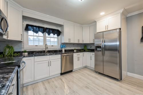 8 Prince Ln, Westbury NY  11590-6229 exterior