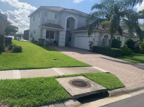 10417 Canal Brook Ln, Lehigh Acres, FL 33936-6628