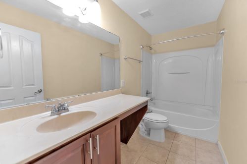 704 Toulon Dr, Kissimmee FL  34759-7020 exterior