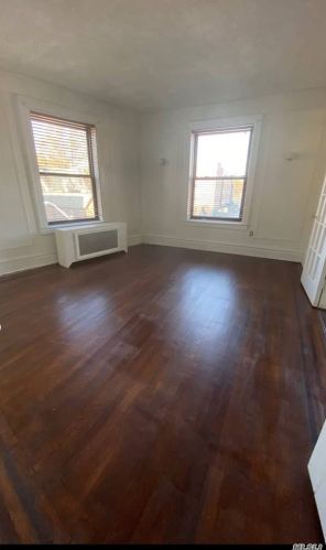 84-02 Beverly Rd, Jamaica, NY 11415-1324
