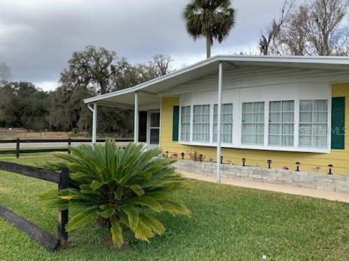15 Wilderness Dr, Lake Panasoffkee, FL 33538-4007
