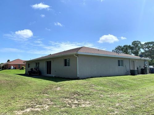 712 Holmes Ave, Lehigh Acres FL 33974-5500 exterior