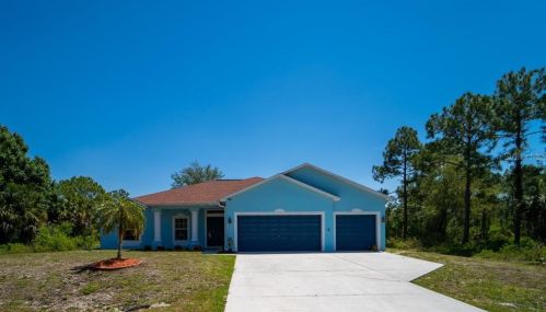 1406 Wellington Ave, Lehigh Acres, FL 33972-2622