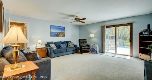 42 Molly Pitcher Ln, East Freehold, NJ 07728-7764