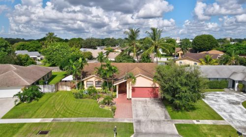1203 Widgeon Rd, West Palm Beach, FL 33414-5052