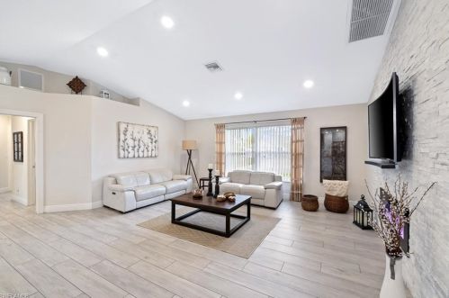 1023 Carl Ave, Lehigh Acres FL 33971-8523 exterior