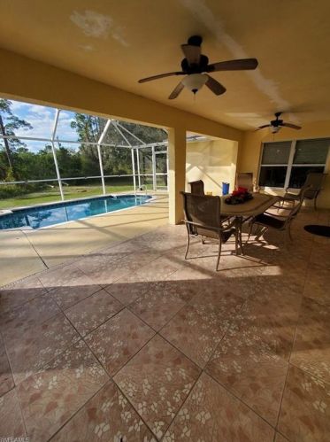 518 Aspen Ave, Lehigh Acres FL 33974-9613 exterior