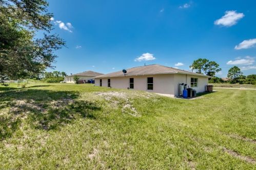 217 Ivan Ave, Lehigh Acres FL 33973-2011 exterior