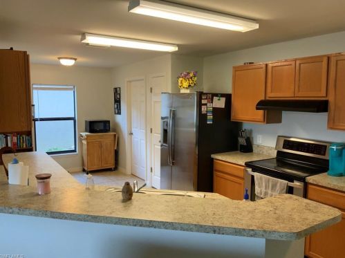 382 Shadow Lakes Dr, Lehigh Acres FL  33974-0807 exterior