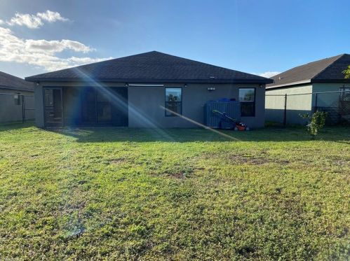 354 Shadow Lk Dr, Lehigh Acres FL 33974-0826 exterior