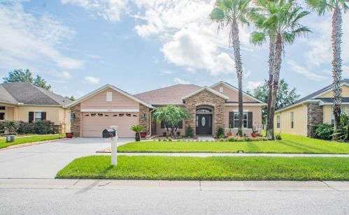 7620 Whispering Wind Dr, Land O Lakes, FL 34637-7833