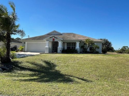 936 Manila Ave, Lehigh Acres, FL 33974-5590