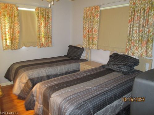 25 Dawn Flower Cir, Lehigh Acres FL 33936-7356 exterior