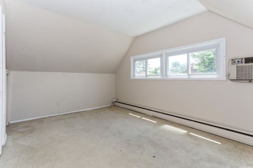 11 Lotus Ln, Westbury NY  11590-6320 exterior