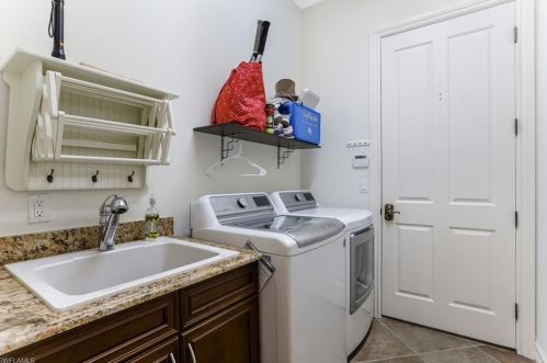 6488 Caldecott Dr, Naples FL  34113-3193 exterior
