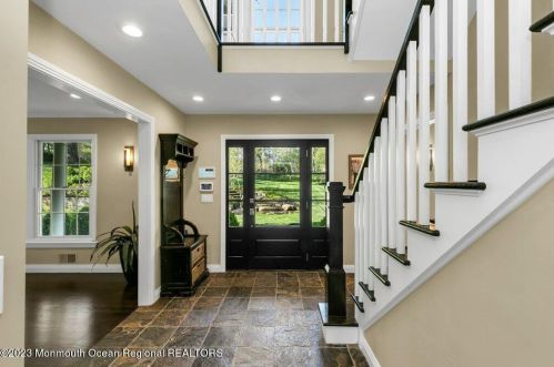 17 Club Way, Tinton Falls, NJ 07701-6303
