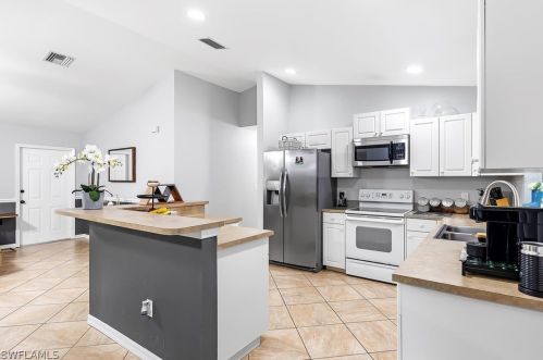 1030 Eubanks St, Lehigh Acres FL  33974-2677 exterior