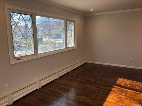 203 Frederick Ave, Roosevelt, NY 11575-2333