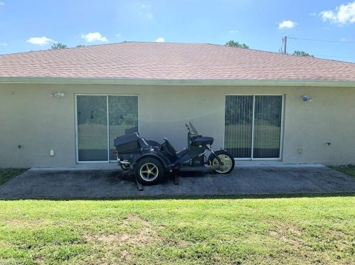712 Holmes Ave, Lehigh Acres FL 33974-5500 exterior