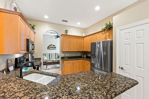 15892 Delaplata Ln, Naples FL 34110-2804 exterior