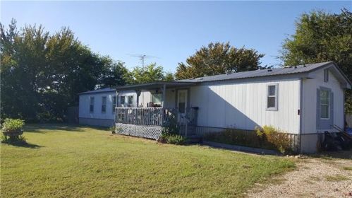 7205 Driggs Dr, Denison, TX 75020-8256
