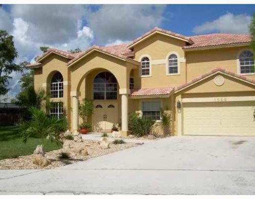 1525 Snapdragon Dr, West Palm Beach, FL 33414-8678