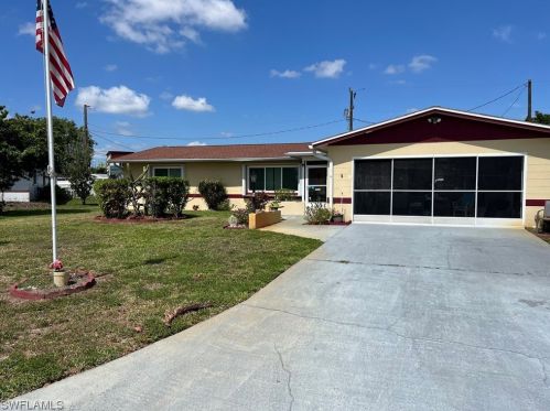 202 Fireside Ct, Lehigh Acres, FL 33936-7004