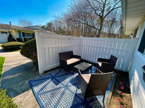 63 Storm Dr, Holtsville NY  11742-1909 exterior
