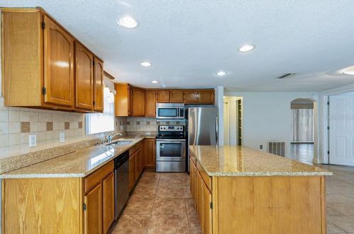 9036 Hunt Club Ln, Port Richey, FL 34668-5128