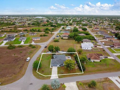 1023 Carl Ave, Lehigh Acres FL 33971-8523 exterior