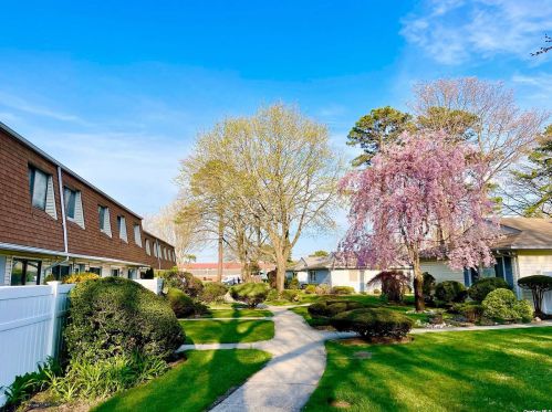 63 Storm Dr, Holtsville NY  11742-1909 exterior
